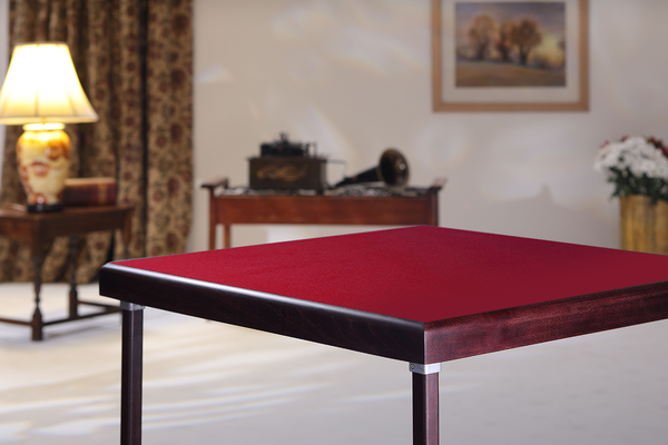Card table with mahogany finish and burgundy baize