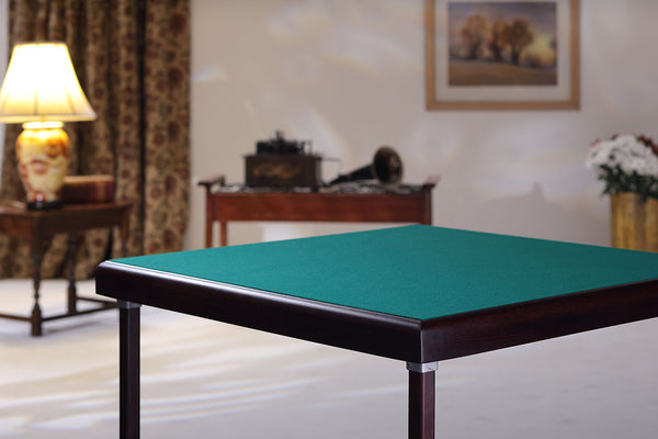 Card table with mahogany finish and green baize